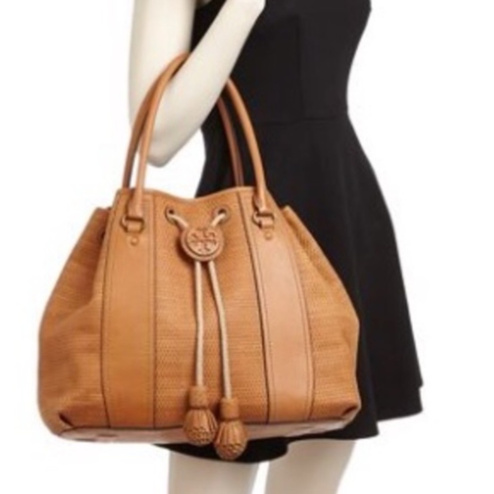 Tory Burch woven leather bag, some wear but looks amazing .